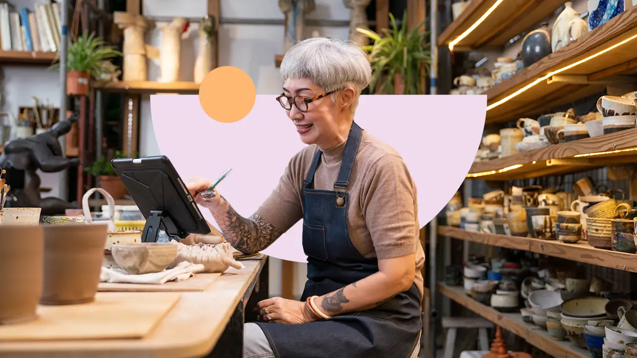 Small business owner using technology